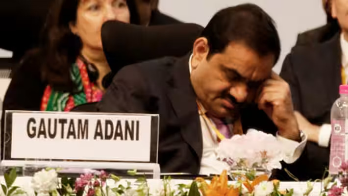 Gautam Adani loses over $8 billion in net worth and drops out of the top 10 list of richest people.