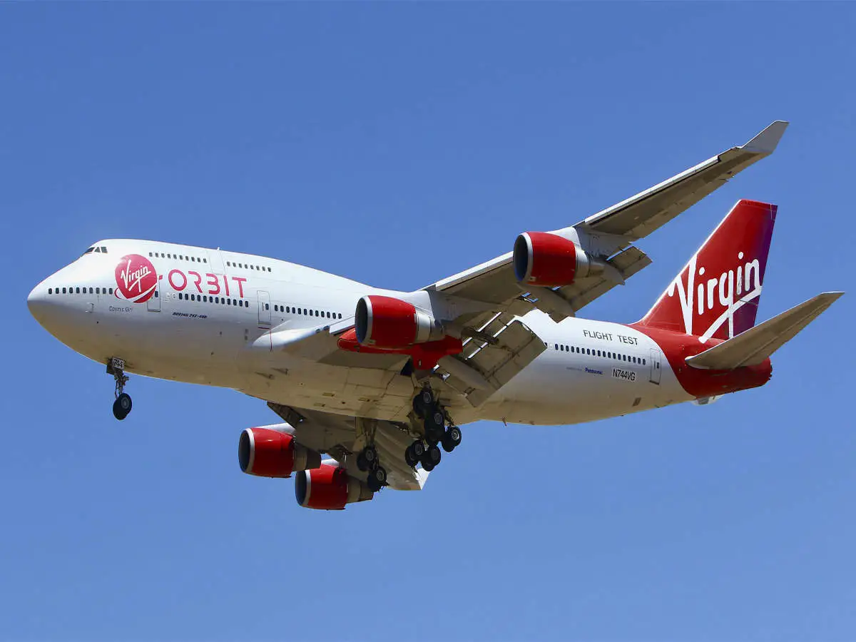 Richard Branson’s rocket company Virgin Orbit suspends operations for a week and seeks additional cash.